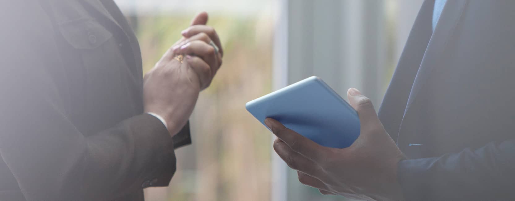 man holding digital tablet